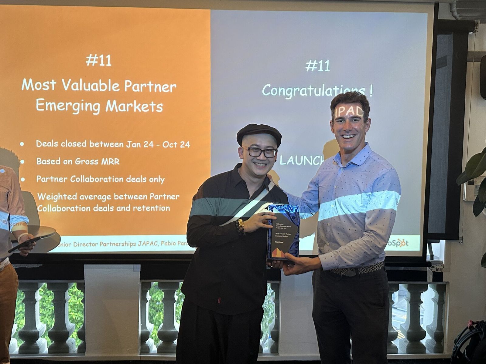Aaron Goh receiving the HubSpot Most Valuable Partner, Emerging Markets award on stage