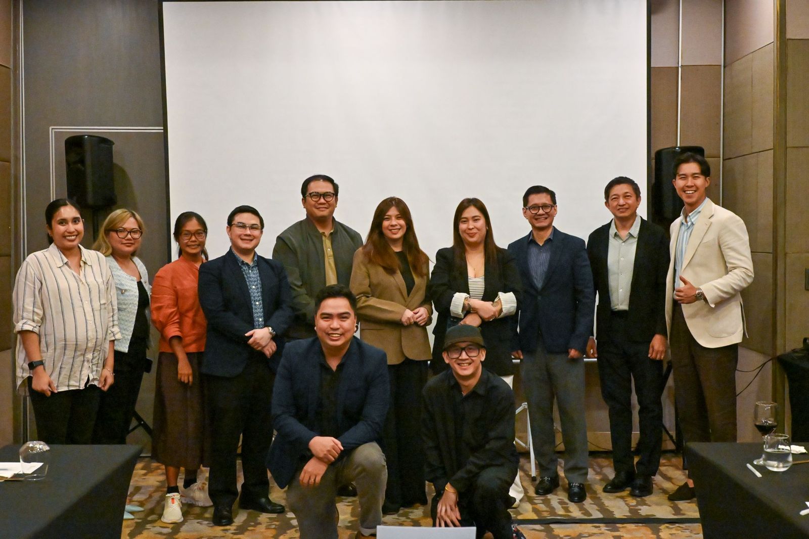 Roundtable participants and the Azend team together after the session